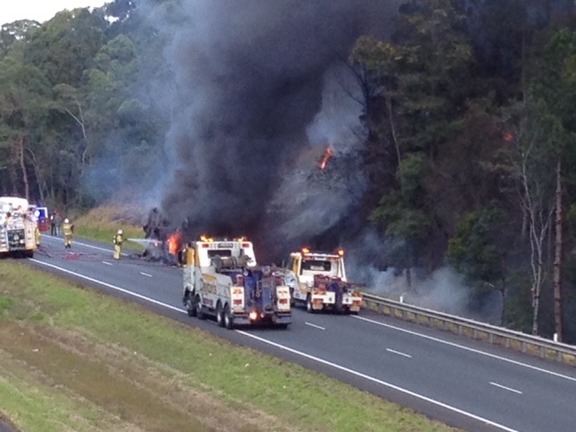 Firefighters at the scene of a school bus fire on the Bruce Highway near Ilkley Road. Firefighters at the scene of a school bus fire on the Bruce Highway near Ilkley Road.