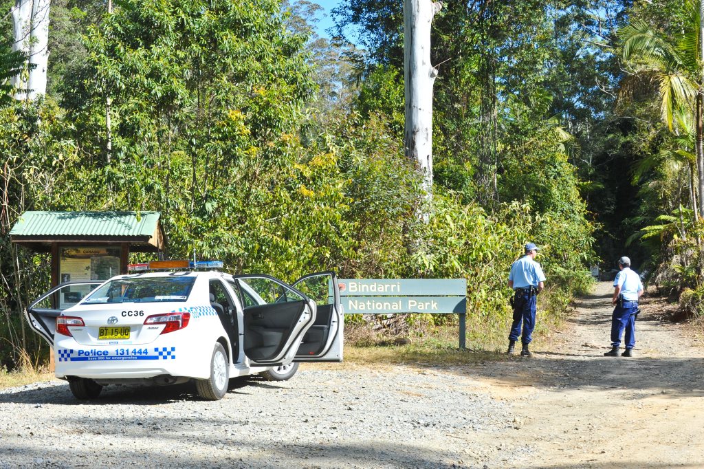 Police set up a roadblock at the entrance to Bindarri National Park near Dairyville as part of an operation to track down a wanted man. Police set up a roadblock at the entrance to Bindarri National Park near Dairyville as part of an operation to track down a wanted man.