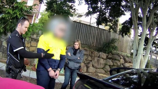 Ex-Bandidos president Adam White is arrested at his Carindale home on Thursday morning. Photo: Queensland Police Service
Ex-Bandidos president Adam White is arrested at his Carindale home on Thursday morning. Photo: Queensland Police Service