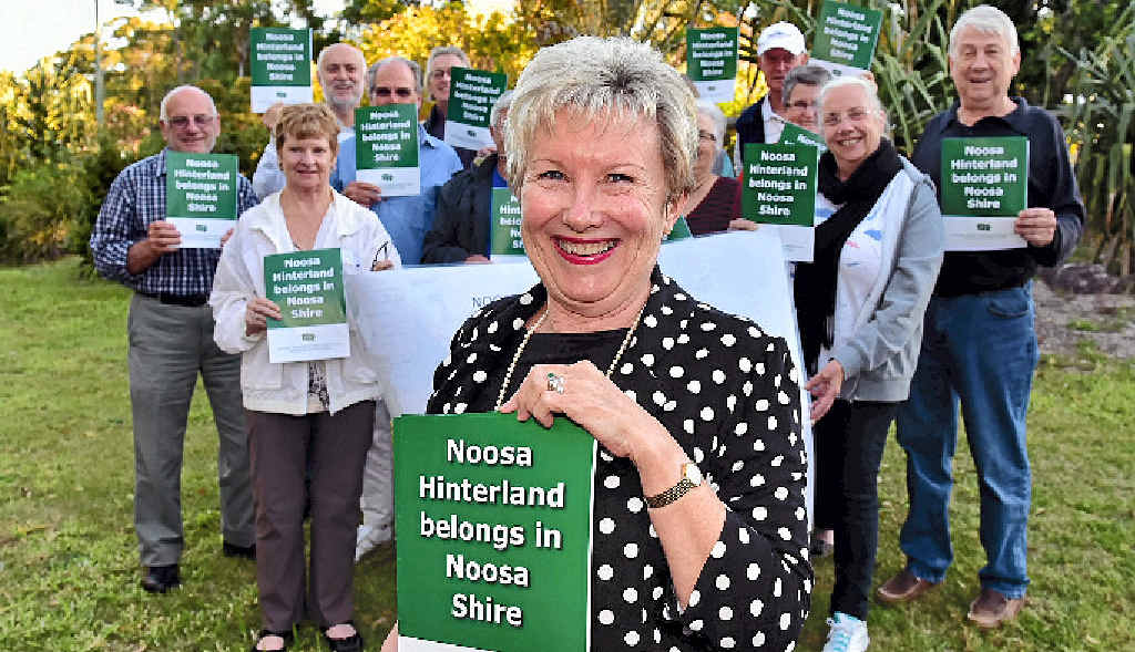 STILL FIGHTING: Johanne Wright leads a protest against Sunshine Coast Council’s decision to stop Eumundi, Doonan, Verrierdale and Weyba Downs residents from joining Noosa Shire. STILL FIGHTING: Johanne Wright leads a protest against Sunshine Coast Council’s decision to stop Eumundi, Doonan, Verrierdale and Weyba Downs residents from joining Noosa Shire.