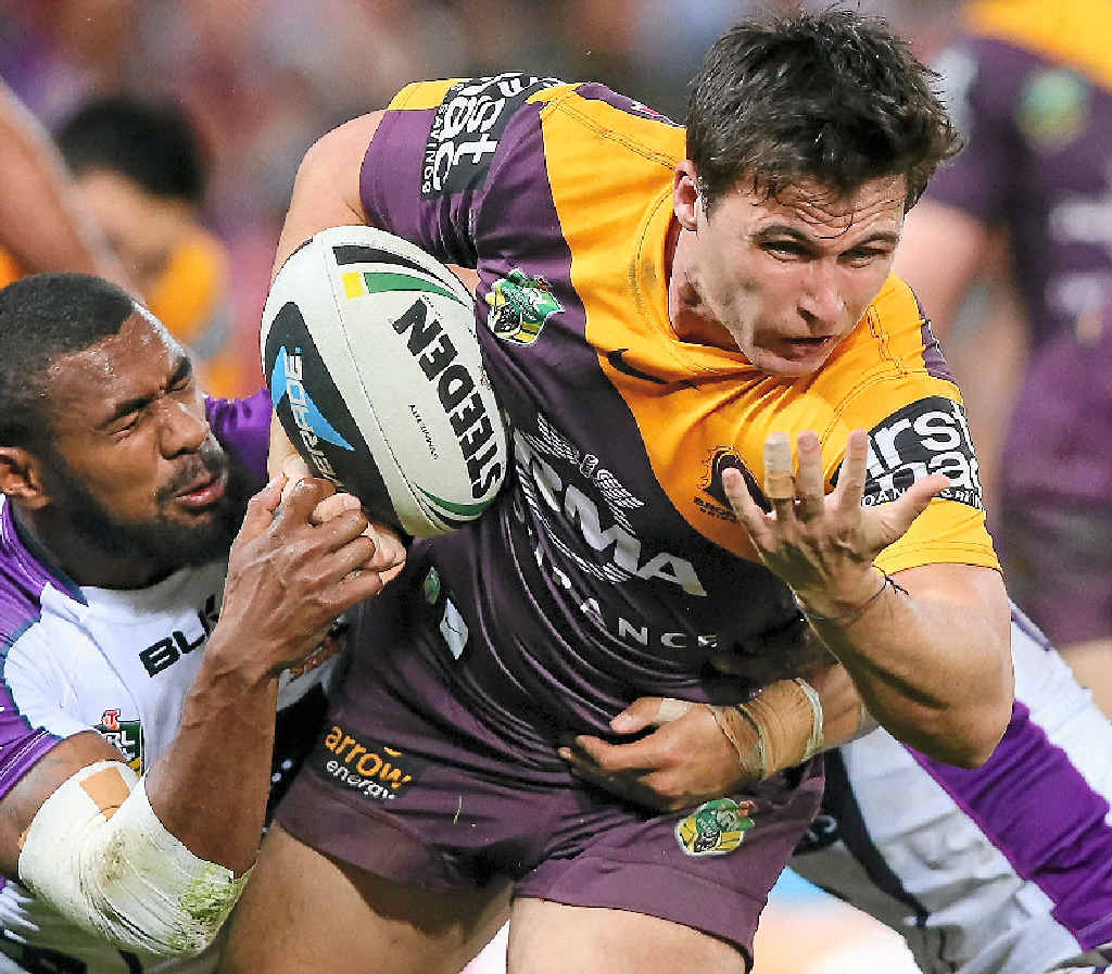 HANGING ON: Lachlan Maranta of the Broncos runs the ball against the Melbourne Storm at Suncorp Stadium last night. HANGING ON: Lachlan Maranta of the Broncos runs the ball against the Melbourne Storm at Suncorp Stadium last night.