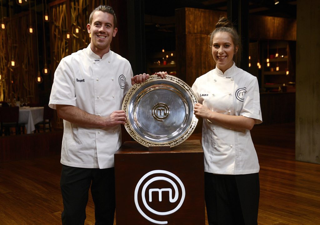 Brent Owens and Laura Cassai in their white aprons during their final cook-off in the MasterChef kitchen. Brent Owens and Laura Cassai in their white aprons during their final cook-off in the MasterChef kitchen.
