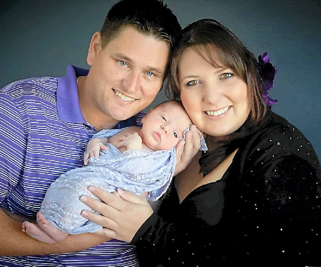 Steve Krause, Stephanie Machen and their pride and joy, Lana. Steve Krause, Stephanie Machen and their pride and joy, Lana.