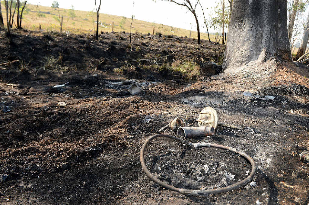 Burned earth and car parts at the site of the road tragedy. Burned earth and car parts at the site of the road tragedy.