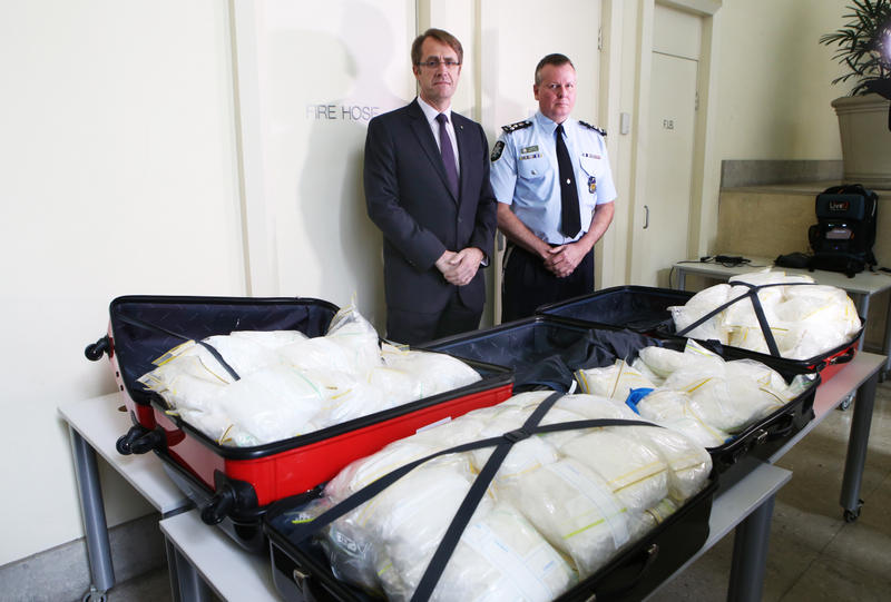 ACC National Manager of Investigations Richard Grant and AFP Commander Bruce Giles (on R) and with approximately 135 kilograms of crystal methylamphetamine that has been seized and four men have been arrested in Victoria, Wednesday, July 30, 2014. ACC National Manager of Investigations Richard Grant and AFP Commander Bruce Giles (on R) and with approximately 135 kilograms of crystal methylamphetamine that has been seized and four men have been arrested in Victoria, Wednesday, July 30, 2014.