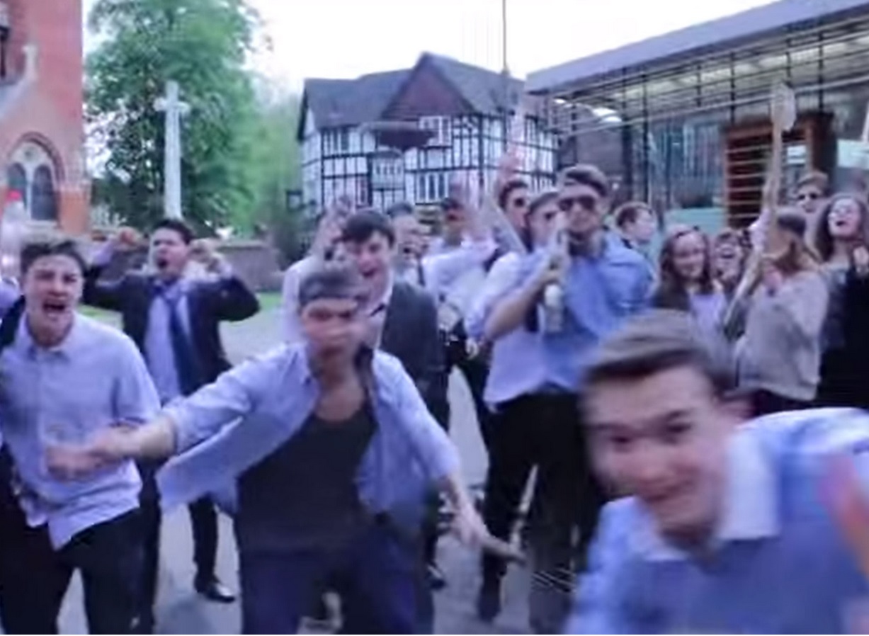 A scene from the video shows students mock rioting A scene from the video shows students mock rioting