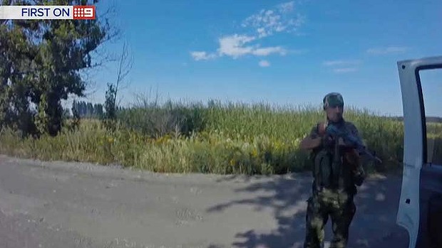 A soldier who held veteran journalist Damian Ryan at gunpoint. Photo: Channel Nine A soldier who held veteran journalist Damian Ryan at gunpoint. Photo: Channel Nine