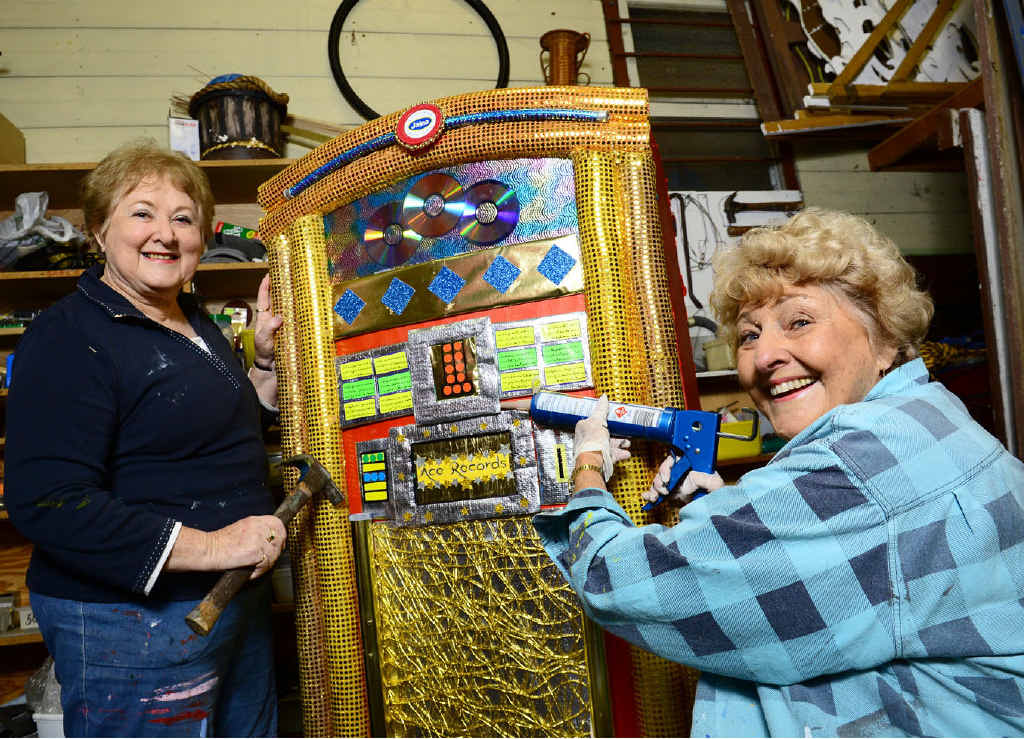 GOLDEN OLDIES: Kay Cross (left) and June Pidgeon use a jukebox they saw in Alice Springs as inspiration for this Miss Saigon stage prop. GOLDEN OLDIES: Kay Cross (left) and June Pidgeon use a jukebox they saw in Alice Springs as inspiration for this Miss Saigon stage prop.
