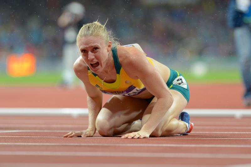 Australia's Sally Pearson reacts after winning the gold medal in the women's 100m hurdles at the athletics at the Olympic Stadium during the Olympic Games in London, Aug. 7, 2012. Australia's Sally Pearson reacts after winning the gold medal in the women's 100m hurdles at the athletics at the Olympic Stadium during the Olympic Games in London, Aug. 7, 2012.