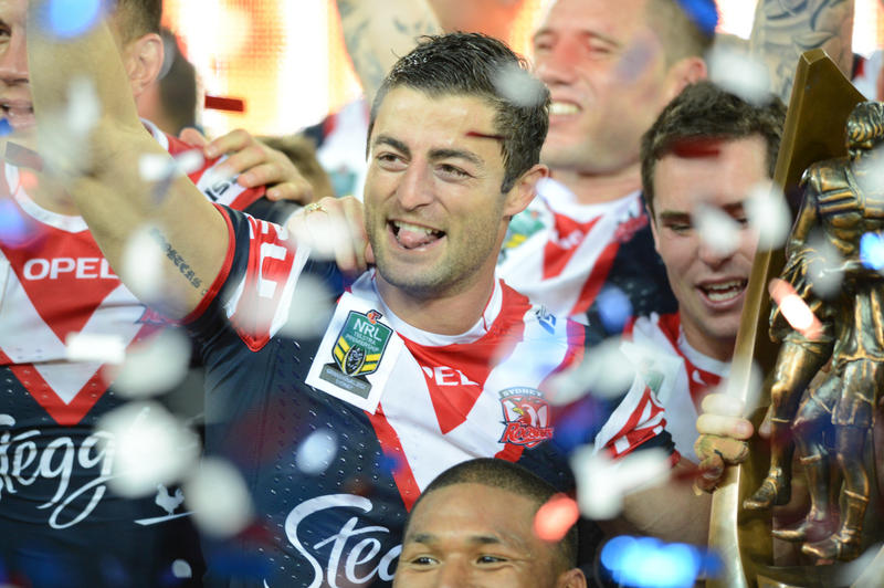 A Sunday, Oct. 6, 2013 file photo of The Roosters' captain Anthony Minichiello celebrates their win in the 2013 NRL Grand Final match between the Sydney Roosters and the Manly Sea Eagles at ANZ Stadium in Sydney. Minichiello has announced he will retire at the end of the 2014 NRL season. A Sunday, Oct. 6, 2013 file photo of The Roosters' captain Anthony Minichiello celebrates their win in the 2013 NRL Grand Final match between the Sydney Roosters and the Manly Sea Eagles at ANZ Stadium in Sydney. Minichiello has announced he will retire at the end of the 2014 NRL season.