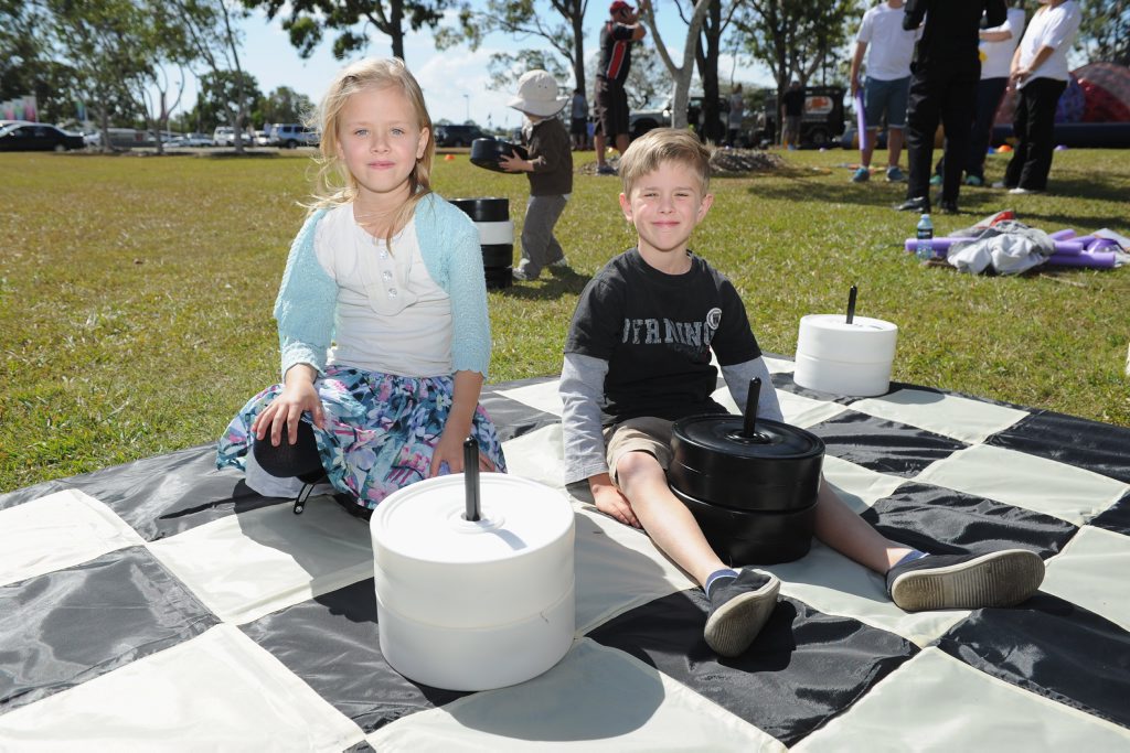 Alice, 7, and Benjamin Shield, 9, playing draughts at the USQ open day. Alice, 7, and Benjamin Shield, 9, playing draughts at the USQ open day.
