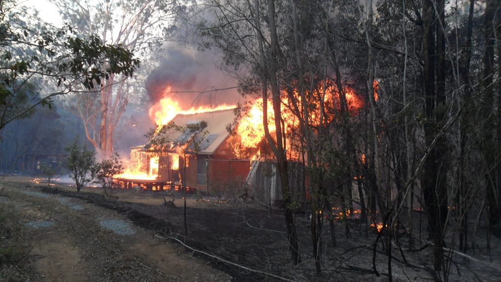 Paul Cameron took this photograph of his house of 28 years soon after he gave up an hour-long battle against the flames armed only with a couple of buckets. Paul Cameron took this photograph of his house of 28 years soon after he gave up an hour-long battle against the flames armed only with a couple of buckets.