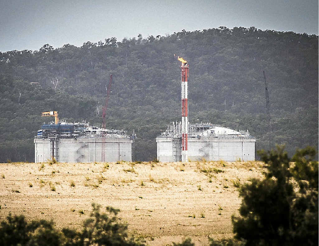 QCLNG lit its flare tower for the first time on Curtis Island on Monday. QCLNG lit its flare tower for the first time on Curtis Island on Monday.