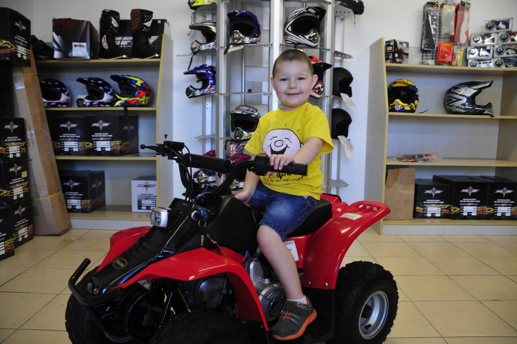 Ben Jessen, 4, whose quad bike was stolen on Monday, was ecstatic to be on the receiving end of immense generosity at the hands of the Gladstone community, and Jane and Richard Robinson at Mild to Wild Motorcycles. Ben Jessen, 4, whose quad bike was stolen on Monday, was ecstatic to be on the receiving end of immense generosity at the hands of the Gladstone community, and Jane and Richard Robinson at Mild to Wild Motorcycles.