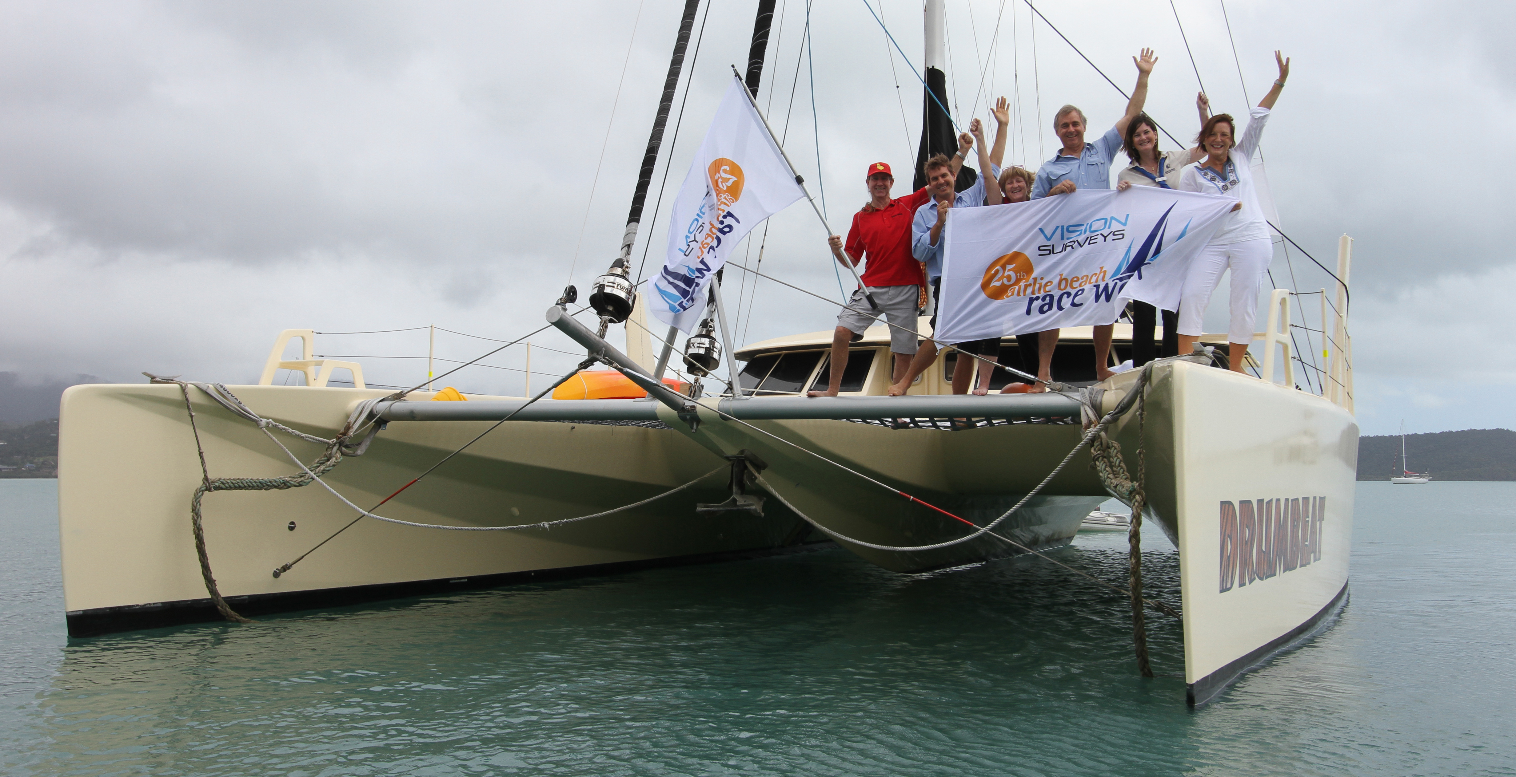 READY TO RACE: WSC commodore and Race Week chairman Jim Hayes, Vision Surveys directors and event sponsors David Wilson and Brian Forrester, Race Week operations manager Angela Rae, media co-ordinator Heidi Walton and sponsorship and marketing manager Corrie Gardner, aboard Drumbeat, Mr Forrester's boat, which will be competing in the 25th annual Airlie Beach Race Week, starting tomorrow. READY TO RACE: WSC commodore and Race Week chairman Jim Hayes, Vision Surveys directors and event sponsors David Wilson and Brian Forrester, Race Week operations manager Angela Rae, media co-ordinator Heidi Walton and sponsorship and marketing manager Corrie Gardner, aboard Drumbeat, Mr Forrester's boat, which will be competing in the 25th annual Airlie Beach Race Week, starting tomorrow.