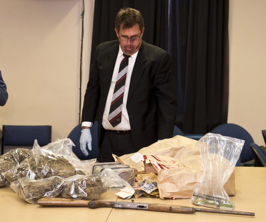 Detective Inspector Mick Dowie speaks to media about the drugs and cash found during raids at Warwick. Detective Inspector Mick Dowie speaks to media about the drugs and cash found during raids at Warwick.