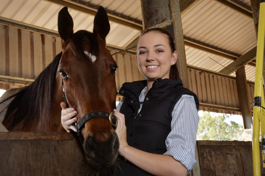 MAGIC TOUCH: Promising Fernvale harness racing enthusiast Brittany Graham loves working with horses. MAGIC TOUCH: Promising Fernvale harness racing enthusiast Brittany Graham loves working with horses.