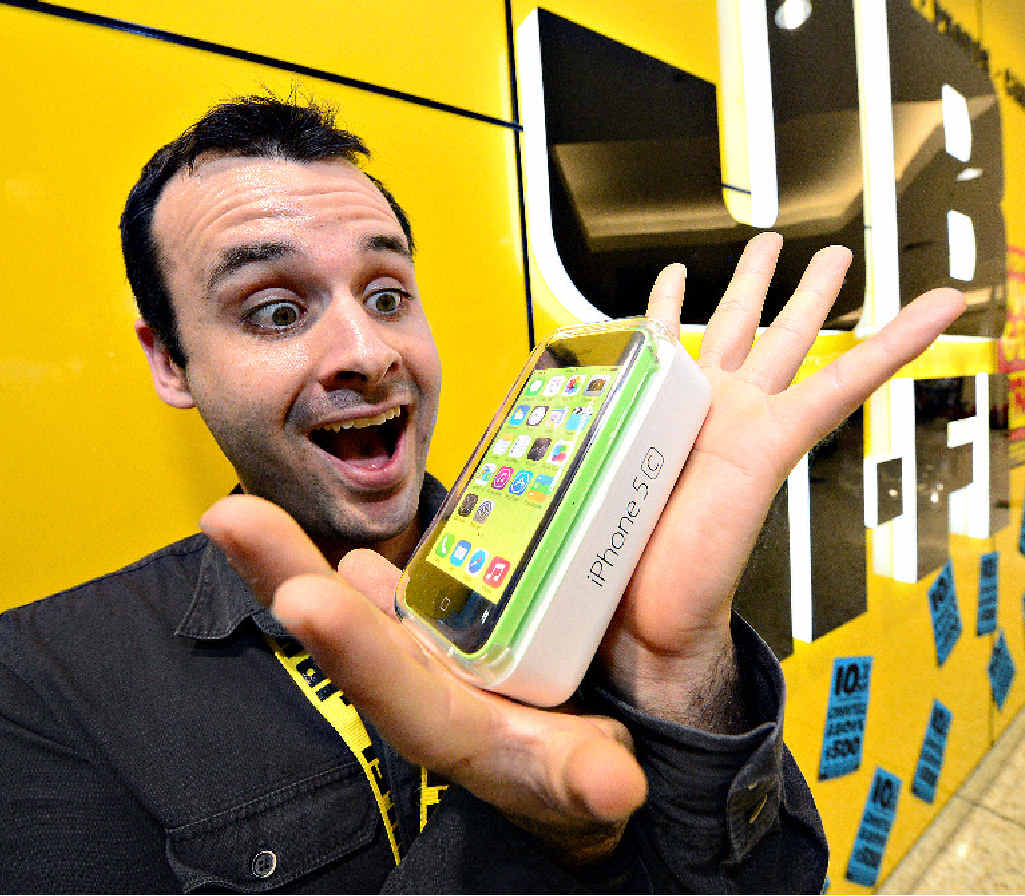APPLE MADNESS: JB Hi-Fi’s telco sales rep Matt Cooper gets excited about all Apple devices. APPLE MADNESS: JB Hi-Fi’s telco sales rep Matt Cooper gets excited about all Apple devices.