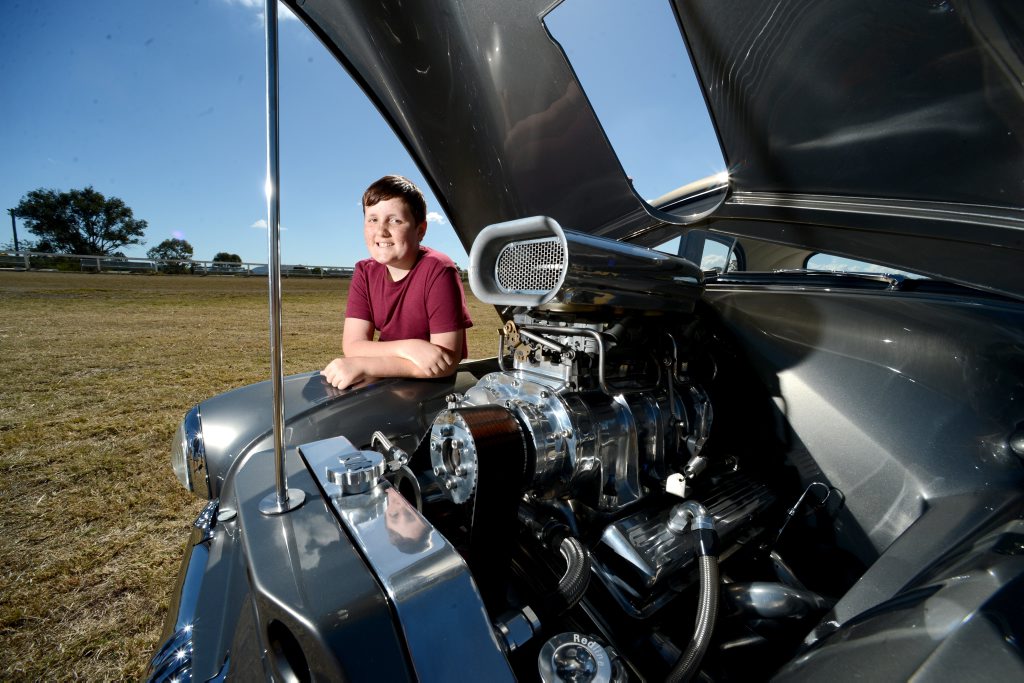 Cruise, and car show at Marburg Showgrounds. Cameron Gathercole 13 years with his dad's 1955 FJ Holden. Photo: Kate Czerny / The Queensland Times Cruise, and car show at Marburg Showgrounds. Cameron Gathercole 13 years with his dad's 1955 FJ Holden. Photo: Kate Czerny / The Queensland Times