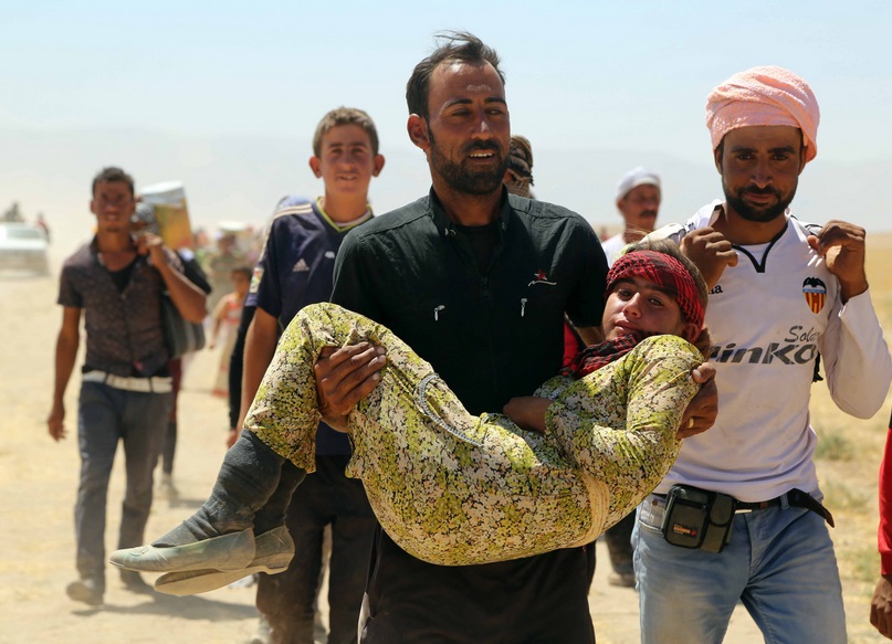 Thousands of Yazidis trapped in the Sinjar mountains are rescued by Kurdish Peshmerga forces in Mosul, Iraq on 9 August, 2014 Thousands of Yazidis trapped in the Sinjar mountains are rescued by Kurdish Peshmerga forces in Mosul, Iraq on 9 August, 2014