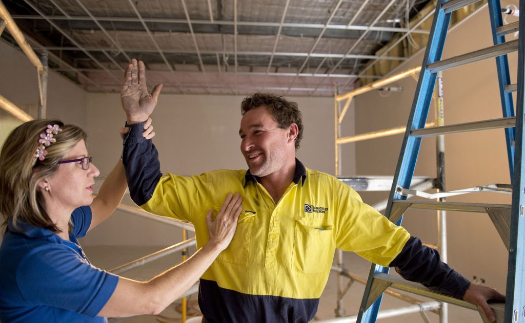 Jackie Robertson, physiotherapist checks out carpenter Will Todd on the job. Jackie Robertson, physiotherapist checks out carpenter Will Todd on the job.