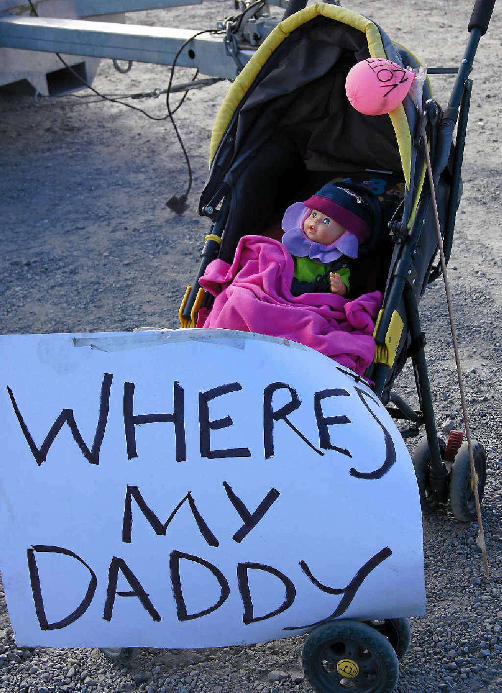 CFMEU workers set up a pram at the Gladstone protest site signifying broken families. CFMEU workers set up a pram at the Gladstone protest site signifying broken families.