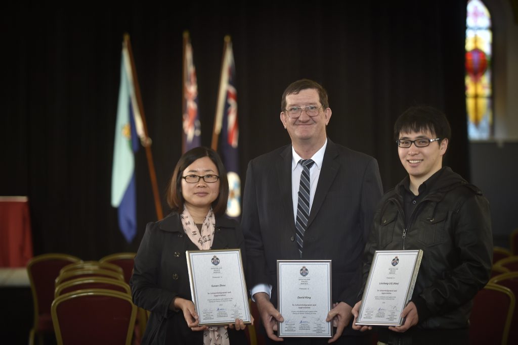 Toowoomba residents (from left) Susan Zhao, David King and Alex Liu were among those recognised at a police awards ceremony yesterday for helping the grief-stricken parents of a young couple who were killed in a Ruthven St crash on Australia Day. Toowoomba residents (from left) Susan Zhao, David King and Alex Liu were among those recognised at a police awards ceremony yesterday for helping the grief-stricken parents of a young couple who were killed in a Ruthven St crash on Australia Day.