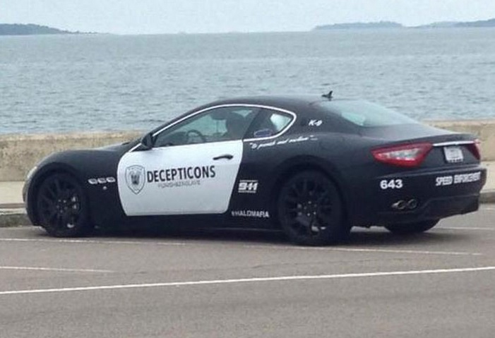 A Maserati resembling a police cruiser and Decepticon sits parked along the shore in Quincy, Massachusetts A Maserati resembling a police cruiser and Decepticon sits parked along the shore in Quincy, Massachusetts
