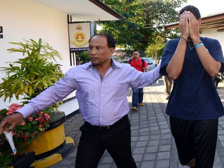 A police officer escorts suspect Tommy Schaffer, 21, during an investigation at a police office in Nusa Dua on Indonesian resort island of Bali A police officer escorts suspect Tommy Schaffer, 21, during an investigation at a police office in Nusa Dua on Indonesian resort island of Bali