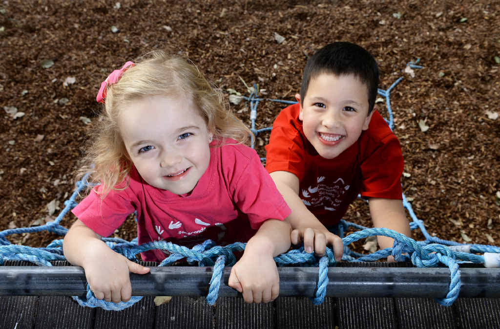 HAPPY: Lucy Day and Keegan Kamoto at the Jacaranda Kindy in Booval, which is celebrating its 35th anniversary. HAPPY: Lucy Day and Keegan Kamoto at the Jacaranda Kindy in Booval, which is celebrating its 35th anniversary.