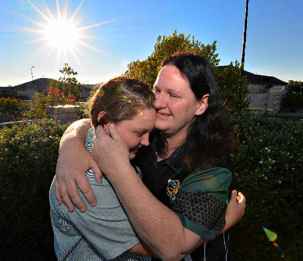 SHINE ON: Sharon Liddell hugs her daughter Shaye after listening to the poem that she wrote about their family’s cancer. SHINE ON: Sharon Liddell hugs her daughter Shaye after listening to the poem that she wrote about their family’s cancer.