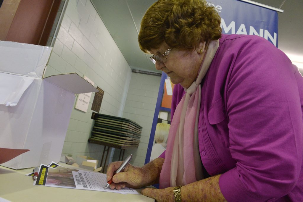 BRING IT BACK: Peggy Frankish signs the petition. BRING IT BACK: Peggy Frankish signs the petition.