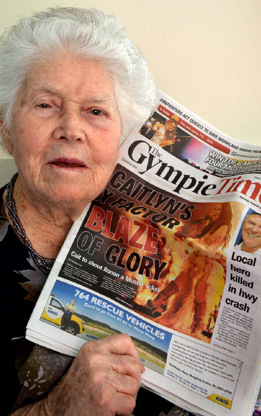 THAT’S MY GIRL: Isabelle Shadbolt proudly shows off great-granddaughter Caitlyn’s photo on the front page of Tuesday’s Gympie Times. Caitlyn (pictured on stage on Sunday night) belted out Bon Jovi’s Blaze of Glory to survive the live elimination. THAT’S MY GIRL: Isabelle Shadbolt proudly shows off great-granddaughter Caitlyn’s photo on the front page of Tuesday’s Gympie Times. Caitlyn (pictured on stage on Sunday night) belted out Bon Jovi’s Blaze of Glory to survive the live elimination.