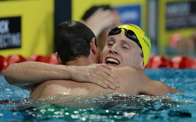 Australia's Thomas Fraser-Holmes (right) reacts with David McKeon after winning the Men's 200m Freestyle final during the Pan Pacific Championships at the Gold Coast Aquatic Centre, on the Gold Coast, Thursday, Aug. 21, 2014. Australia's Thomas Fraser-Holmes (right) reacts with David McKeon after winning the Men's 200m Freestyle final during the Pan Pacific Championships at the Gold Coast Aquatic Centre, on the Gold Coast, Thursday, Aug. 21, 2014.