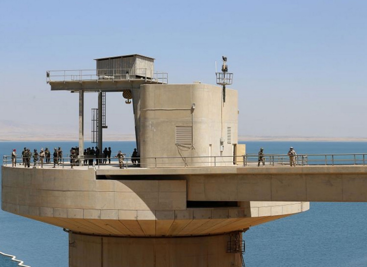 Peshmerga fighters guarding Mosul dam; the US provided air cover for Kurdish and Iraqi forces in the area Peshmerga fighters guarding Mosul dam; the US provided air cover for Kurdish and Iraqi forces in the area