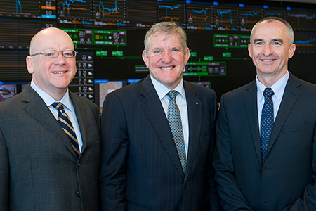QGC's Walter Simpson, Industry Minister Ian Macfarlane and QGC's managing director Mitch Ingram at the opening of the Brisbane operations hub. QGC's Walter Simpson, Industry Minister Ian Macfarlane and QGC's managing director Mitch Ingram at the opening of the Brisbane operations hub.