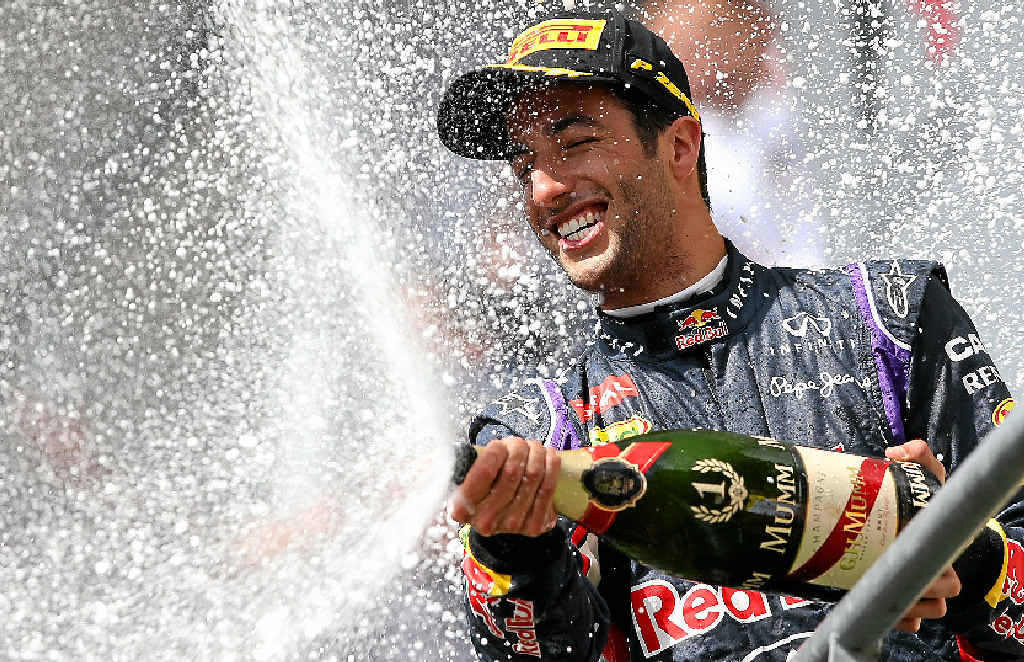 Daniel Ricciardo celebrates his win. Daniel Ricciardo celebrates his win.