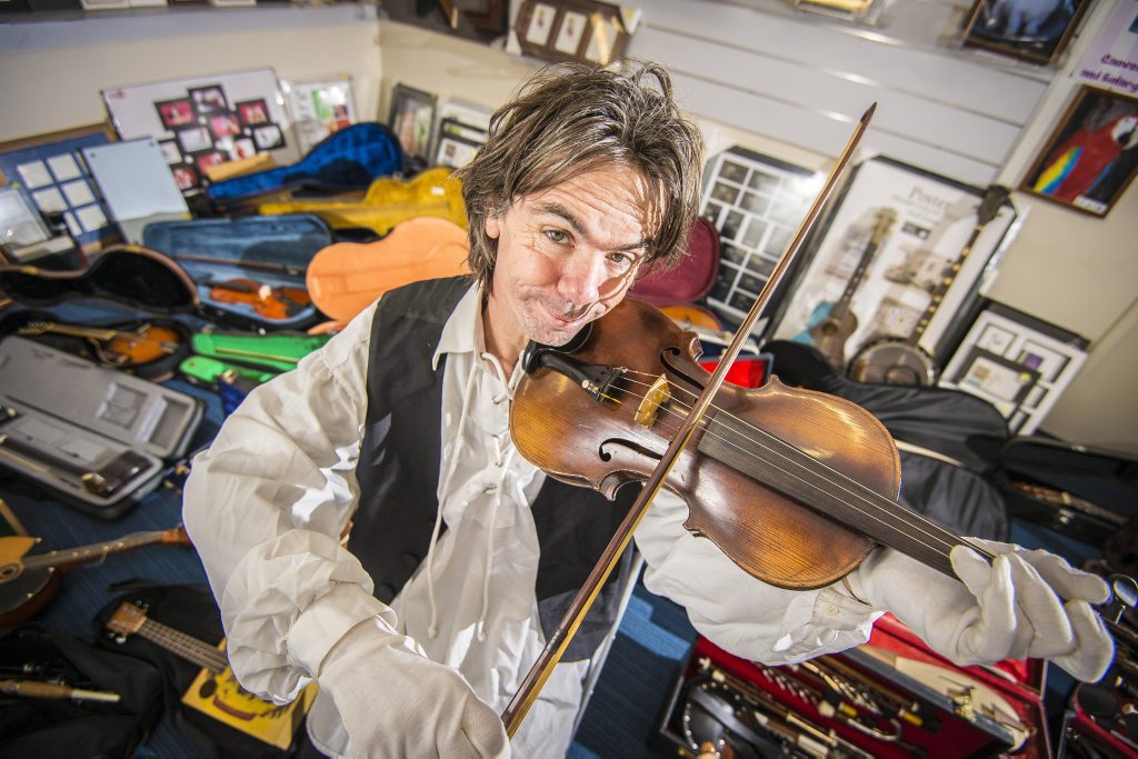 Ian Watts holds his 17th century violin, an Antonius Stradivarius Cremona Faciebat Anno 1681, amongst the rest of his collection. Ian Watts holds his 17th century violin, an Antonius Stradivarius Cremona Faciebat Anno 1681, amongst the rest of his collection.
