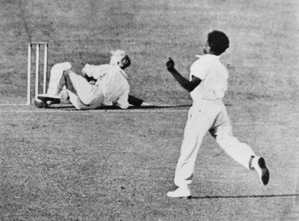 Queensland bowler Eddie Gilbert puts Donald Bradman on his backside during a Sheffield Shield match in 1931. Queensland bowler Eddie Gilbert puts Donald Bradman on his backside during a Sheffield Shield match in 1931.