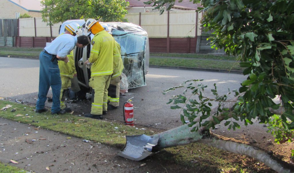 BAD START TO THE DAY: Emergency services were in action early yesterday at the scene of a single-vehicle crash on Ripley Rd, Raceview. BAD START TO THE DAY: Emergency services were in action early yesterday at the scene of a single-vehicle crash on Ripley Rd, Raceview.
