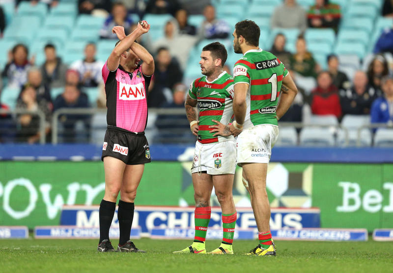 Rabbitohs player Adam Reynolds (C) is placed on report for a tackle on Bulldogs player Moses Mybe during the Round 25 NRL match between the Canterbury-Bankstown Bulldogs and the South Sydney Rabbitohs at ANZ Stadium, Sydney, Thursday, Aug. 28, 2014. Rabbitohs player Adam Reynolds (C) is placed on report for a tackle on Bulldogs player Moses Mybe during the Round 25 NRL match between the Canterbury-Bankstown Bulldogs and the South Sydney Rabbitohs at ANZ Stadium, Sydney, Thursday, Aug. 28, 2014.