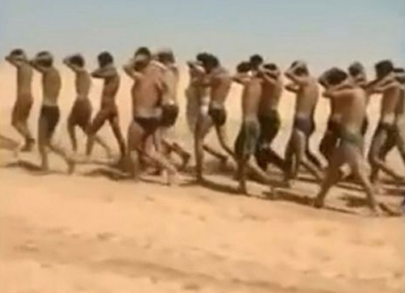 Young men in underwear being marched barefoot along a desert road before being allegedly executed by Isis Young men in underwear being marched barefoot along a desert road before being allegedly executed by Isis