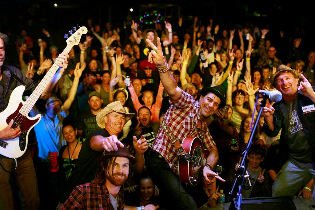 BOMBS AWAY: Artist Nicky Bomba (second from right) and festival-goers let loose at GrottoFest 2012. Bomba and his band are set to will perform again this year BOMBS AWAY: Artist Nicky Bomba (second from right) and festival-goers let loose at GrottoFest 2012. Bomba and his band are set to will perform again this year