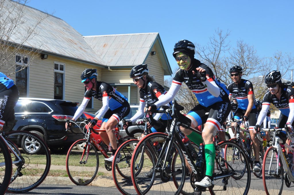 Image for sale: Before pulling out of Monto on their 1600km bike ride from Brisbane to Townsville, the Smile for Smiddy cyclists pulled in at St Therese's Catholic School to teach the kids about sun safety.