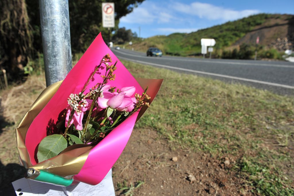 Flowers laid at the site of a single vehicle accident where four people were killed when the car left the road and collided with a tree near Newrybar. Flowers laid at the site of a single vehicle accident where four people were killed when the car left the road and collided with a tree near Newrybar.