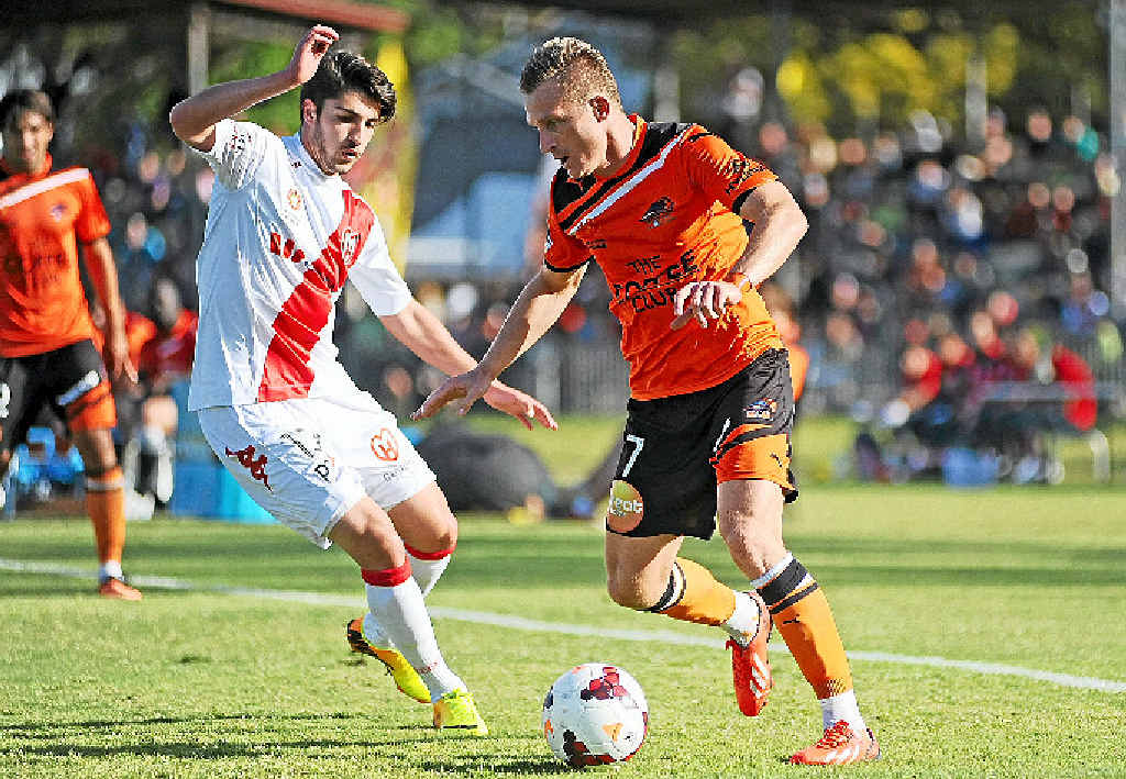 ON THE BALL: Scenes from last year’s pre-season A League game at Oakes Oval in Lismore, between Brisbane Roar (in orange) and Melbourne Heart (now Melbourne City). ON THE BALL: Scenes from last year’s pre-season A League game at Oakes Oval in Lismore, between Brisbane Roar (in orange) and Melbourne Heart (now Melbourne City).