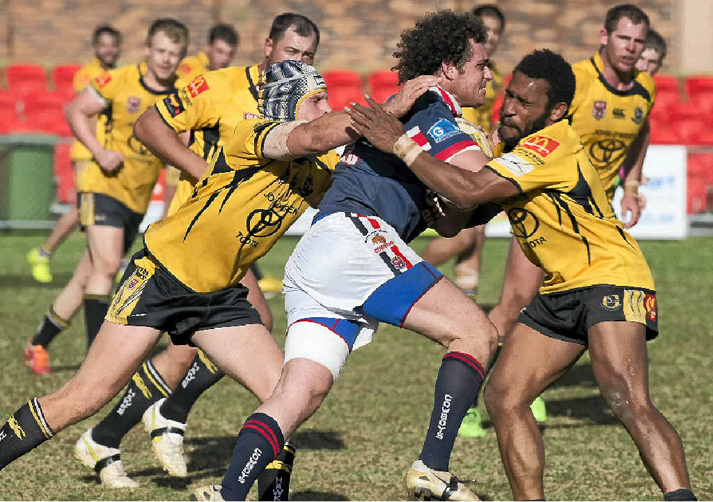 STRONG HIT-UP: Luke Brosnan takes the ball up for the Warwick Cowboys against the Gatton Hawks in the TRL A-grade preliminary final at Clive Berghofer Stadium on Sunday. STRONG HIT-UP: Luke Brosnan takes the ball up for the Warwick Cowboys against the Gatton Hawks in the TRL A-grade preliminary final at Clive Berghofer Stadium on Sunday.