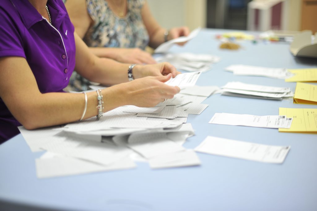 Senior Issuing Officers counting votes Senior Issuing Officers counting votes