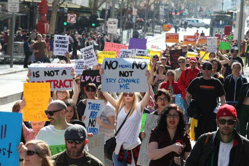 Protesters march in the Melbourne SlutWalk. Saturday, September 6, 2014. The marchers are protesting against sexual violence. Protesters march in the Melbourne SlutWalk. Saturday, September 6, 2014. The marchers are protesting against sexual violence.