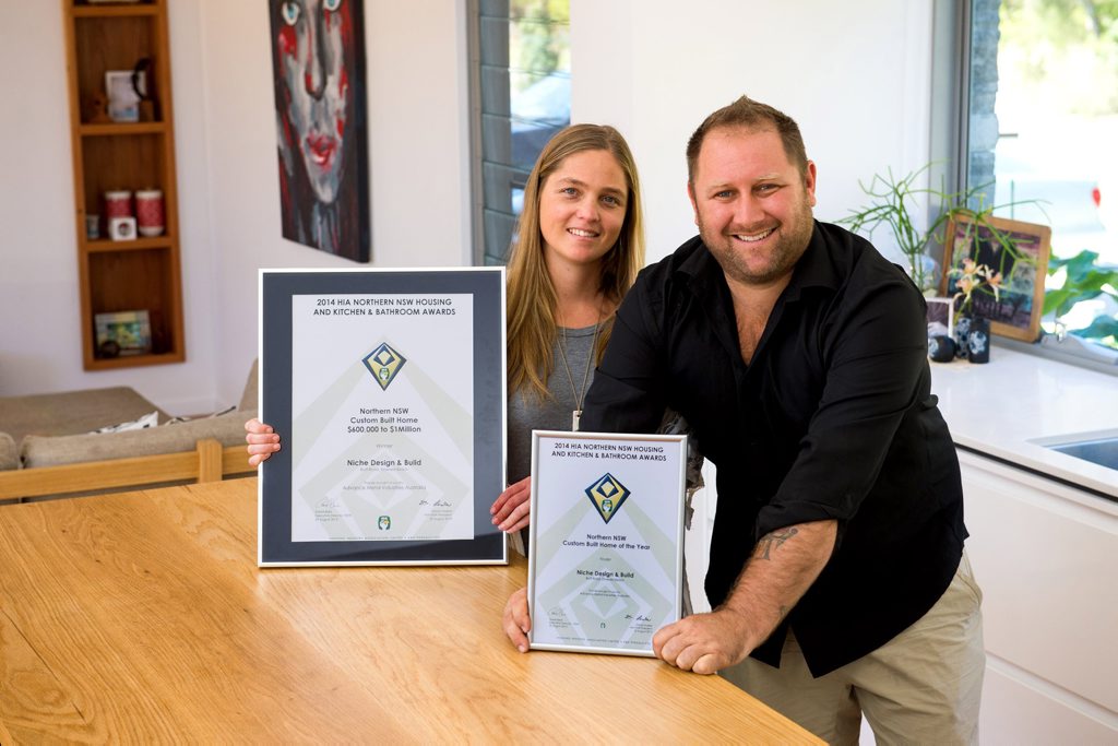 Niche design build win HIA award. Shelley Brauer and Nathan Whitlock with their award and house. Photo Trevor Veale / Coffs Coast Advocate Niche design build win HIA award. Shelley Brauer and Nathan Whitlock with their award and house. Photo Trevor Veale / Coffs Coast Advocate